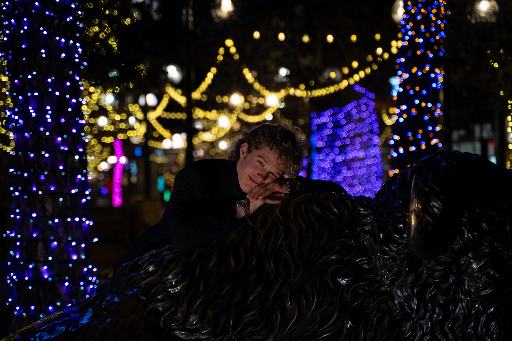 Drew looking cute with the buffalo statue :)