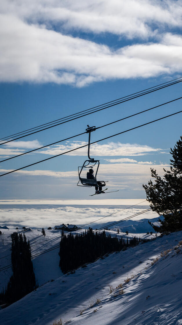 Another photo of the man on the chairlift